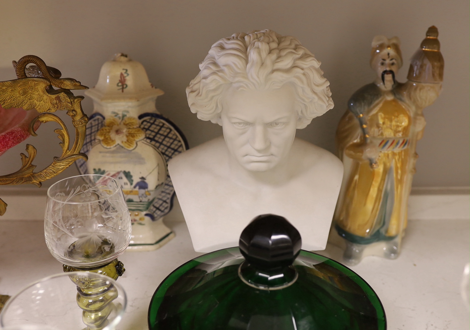 A French ruby lustre and ormolu mounted centrepiece, a green faceted glass bowl and cover, two Nymphenburg dishes, a pearlware dessert dish and other ceramics and glass